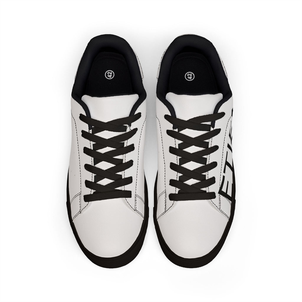Leather Low-Top Sneakers — Bold "ETIENNE" Side Logo