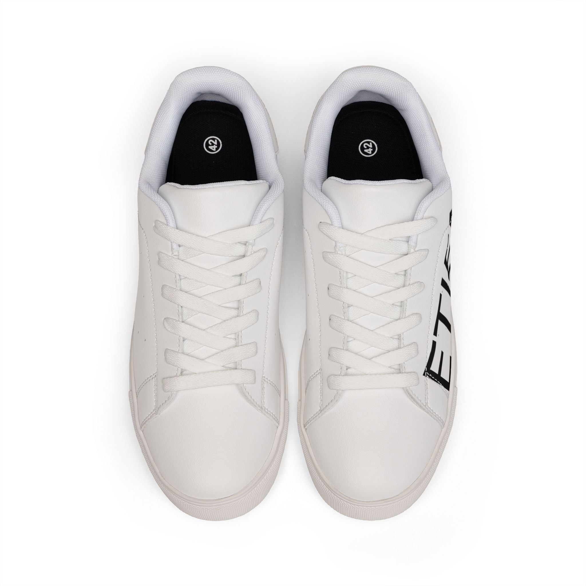 Leather Low-Top Sneakers — Bold "ETIENNE" Side Logo